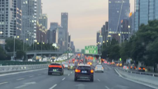 驾车行驶在北京城市cbd视频素材模板下载
