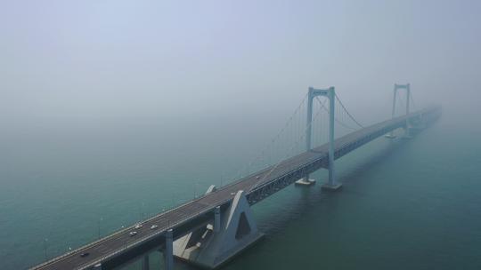 航拍大连雾中的星海湾跨海大桥