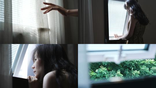 女孩在窗边看窗外风景 思考心事视频素材模板下载