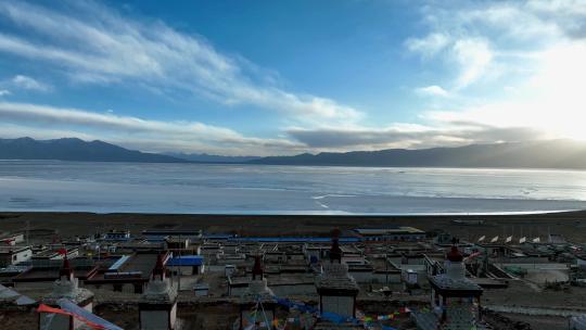 航拍西藏那曲当惹雍措湖畔文布南村白塔风光视频素材模板下载