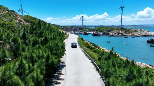 汽车行驶在海边公路航拍风景旅拍旅行自驾游