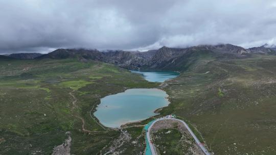 航拍四川甘孜巴塘海子山姊妹湖高原牧场风光