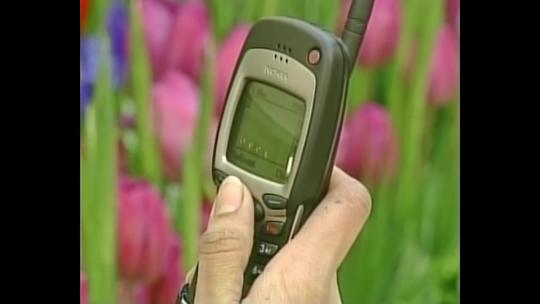 90年代人们使用手机的场景