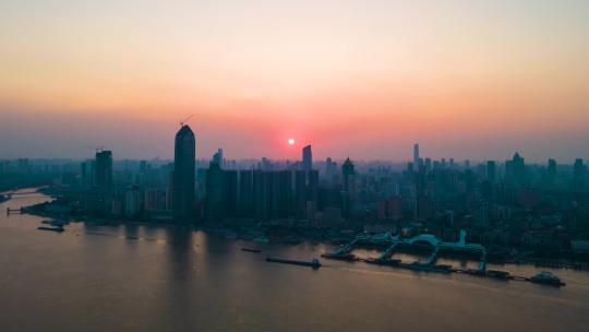 湖北武汉城市清晨迷雾日出彩霞航拍移动延时