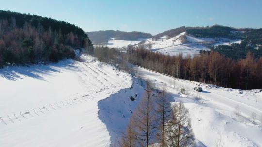 4k航拍雪后的山林