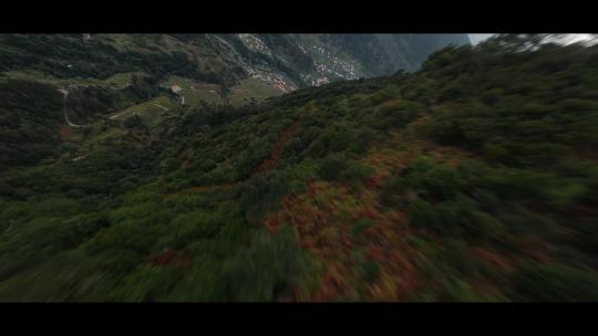 镜头运动航拍飞过山峰森林