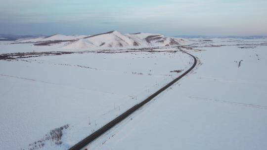 原创 内蒙古呼伦贝尔雪原公路自然风光航拍视频素材模板下载