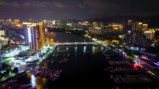 航拍海南三亚游艇旅游中心与帆船港帆船夜景