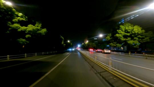 夜晚杭州市文一西路车尾行车空镜