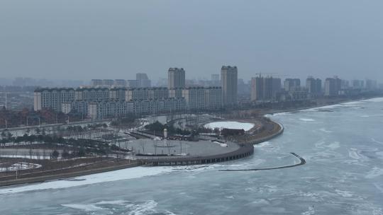 吉林珲春市冬季珲春河城市风光航拍