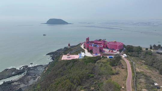 航拍福建漳州火山岛度假旅游区粉红城堡