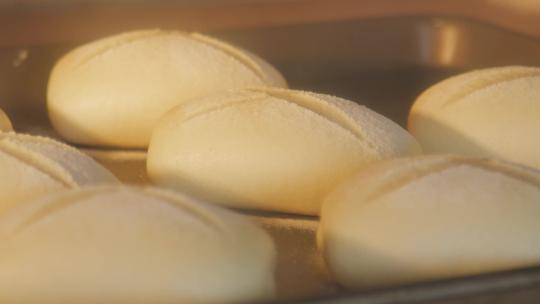 烤箱烘焙面包面包膨胀视频素材模板下载