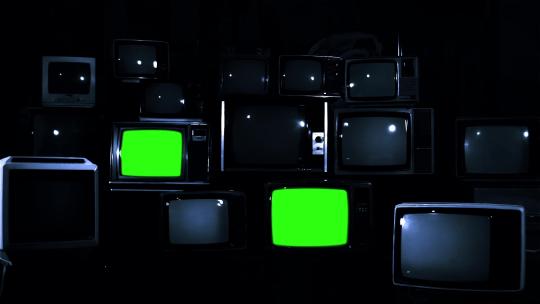 一堆复古电视打开绿色屏幕视频素材模板下载