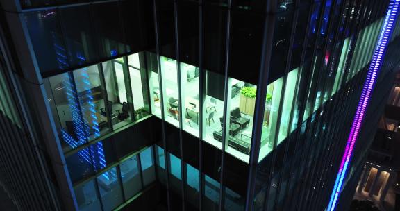 现代城市玻璃幕墙写字楼办公室夜景