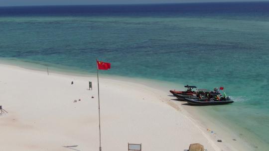 西沙群岛南海岛礁渔船国旗航拍视频素材模板下载