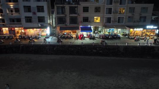 广西涠洲岛 南湾老街 店铺 游客 夜景 海岸视频素材模板下载