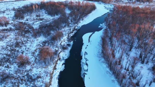 航拍4K雪原河流风光