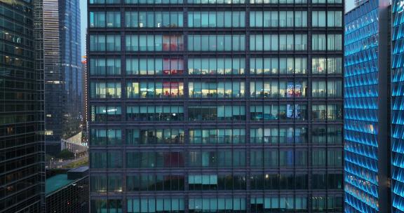 现代城市玻璃幕墙写字楼办公室夜景