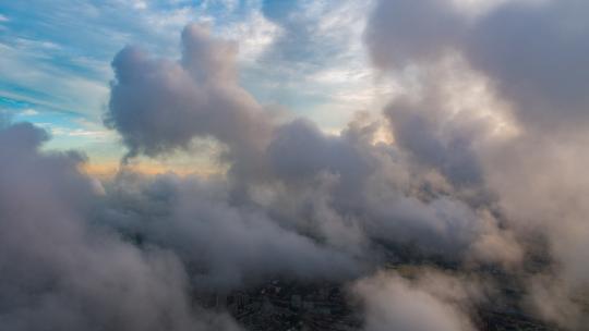 航拍城市上空的云朵视频素材模板下载