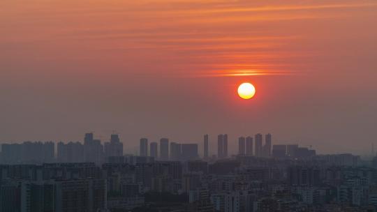 城市夕阳西下太阳落山延时摄影