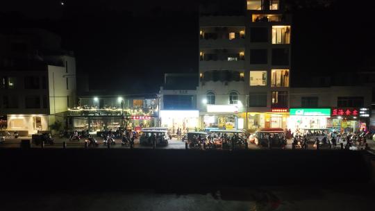 广西涠洲岛 南湾老街 店铺 游客 夜景 海岸视频素材模板下载