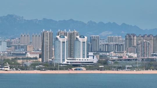 航拍沿海城市海岸线游艇码头