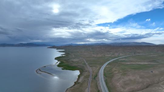航拍旅游川藏线国道上交通道路与自然湖景