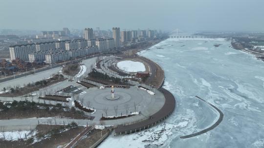 吉林珲春市冬季珲春河城市风光航拍