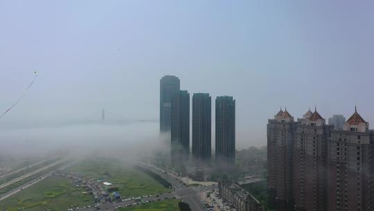 航拍大连云雾下的星海城市广场