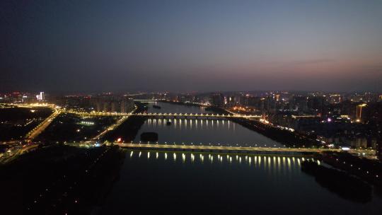 河南洛阳洛河夜幕降临夜景航拍视频素材模板下载