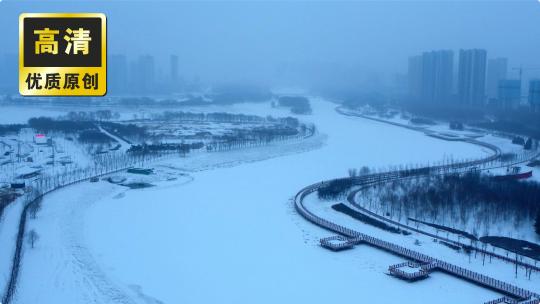 航拍冬季河面湖面 雪后城市湖面结冰