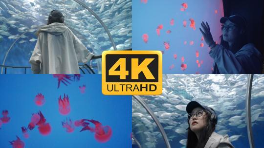 女孩参观水族馆海洋馆高清在线视频素材下载