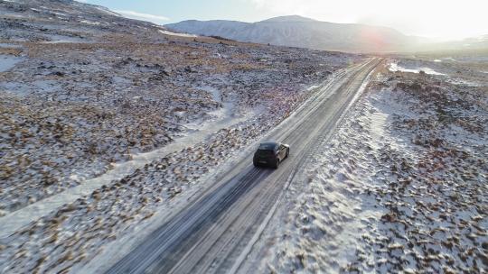 4K冬季新疆冰天雪地公路行驶汽车航拍合集