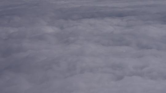 民航客机玄窗外的蓝天白云视频素材模板下载