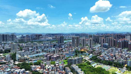 航拍广东惠州蓝天白云城市建筑群街景