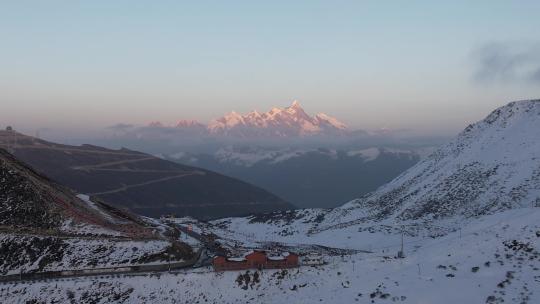 西藏自治区林芝雪山航拍日照金山