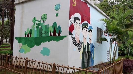 城市街边建筑墙面上的国风绘画和宣传标语4K