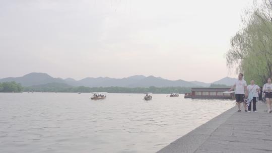 【杭州西湖】湖边人流延时视频素材模板下载