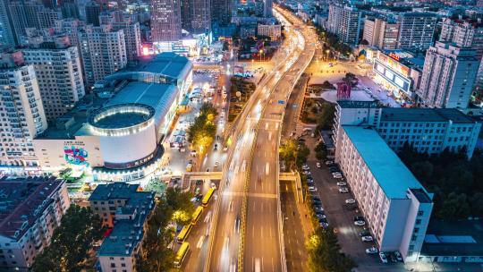 中国哈尔滨乐松广场城市夜景车流延时航拍