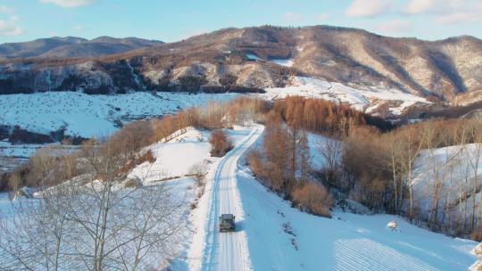 4k航拍雪后的山林