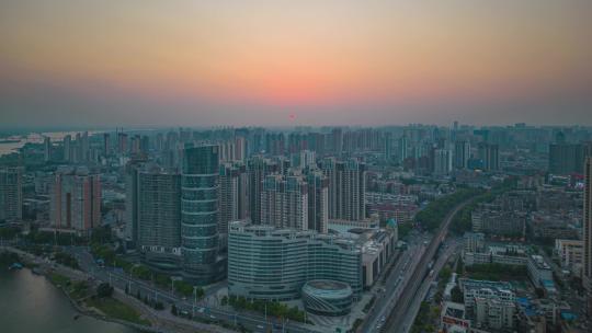 湖北襄阳城市日落晚霞夕阳航拍移动延时