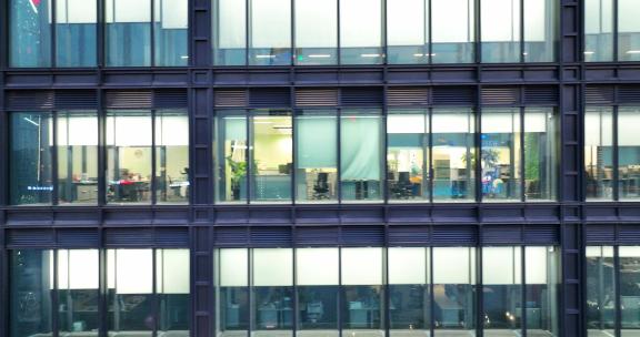 现代城市玻璃幕墙写字楼办公室夜景