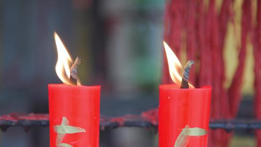 红蜡烛寺庙香火蜡烛燃烧生格意境视频素材模板下载