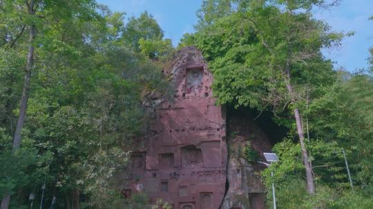 航拍岩壁石窟佛教雕塑视频素材模板下载