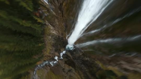 穿越机坠落瀑布溪流视频素材模板下载