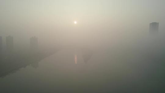 云雾缭绕的衡阳湘江城市风光4k航拍