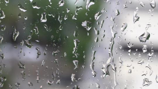 雨季白天夜晚窗户上的雨滴【商用需购买】视频素材模板下载