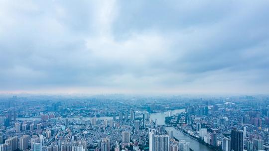 广州珠江岸城市建筑群与天空云雾航拍延时
