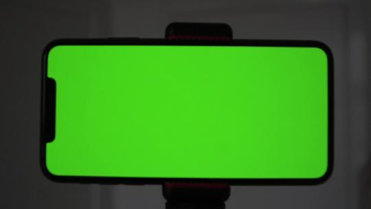 手机绿屏的特写视频素材模板下载