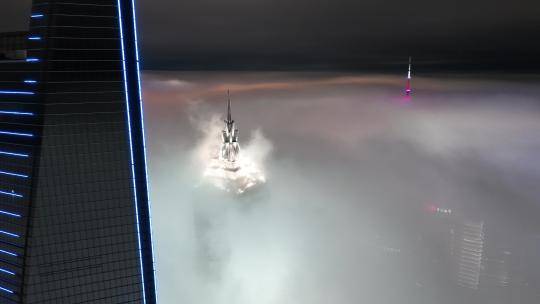 航拍云雾中的金茂大厦视频素材模板下载